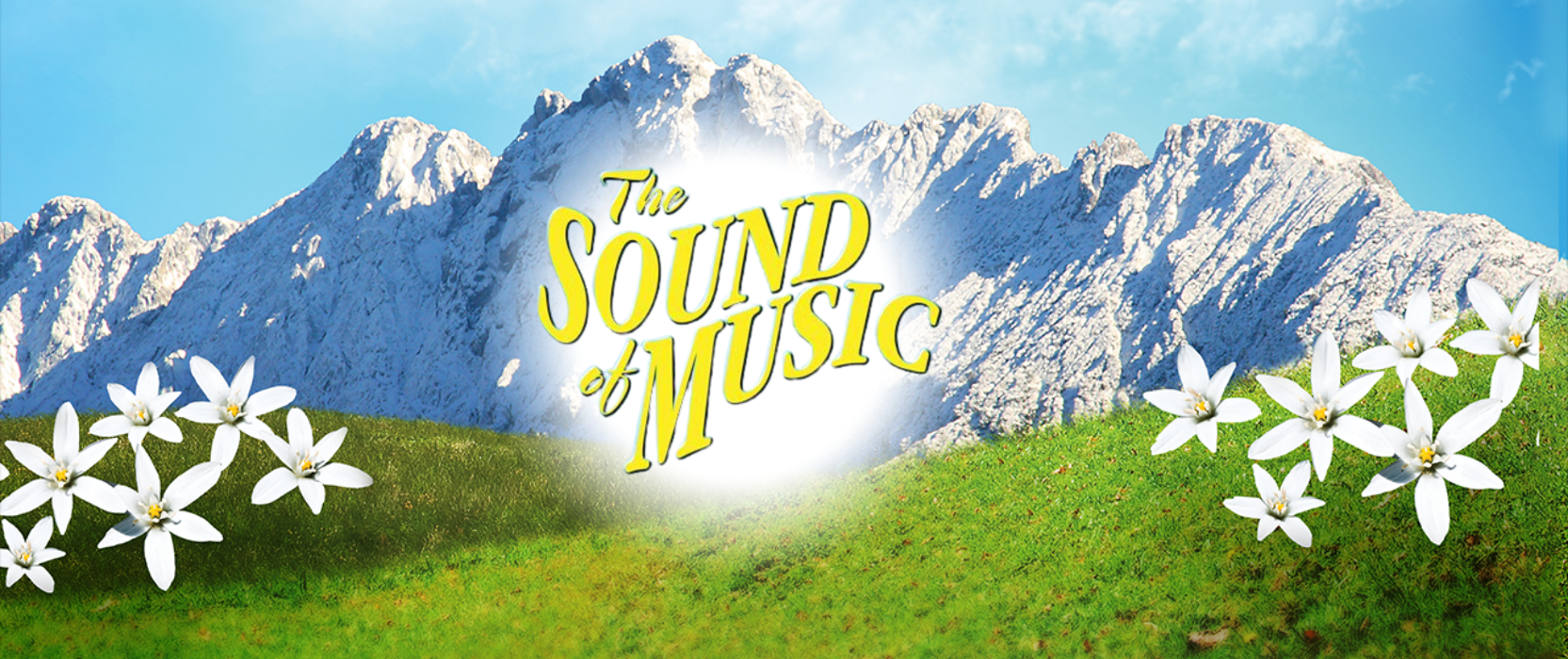 a mountain range and a green field of with white flowers. text reads The Sound of Music